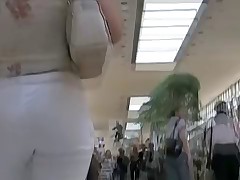 Sweet chick with big butt jeans is in the shoe shop having no clue to be spied on cam