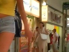 This is the video that features a sexy girl in jeans shorts and also amateur up skirt